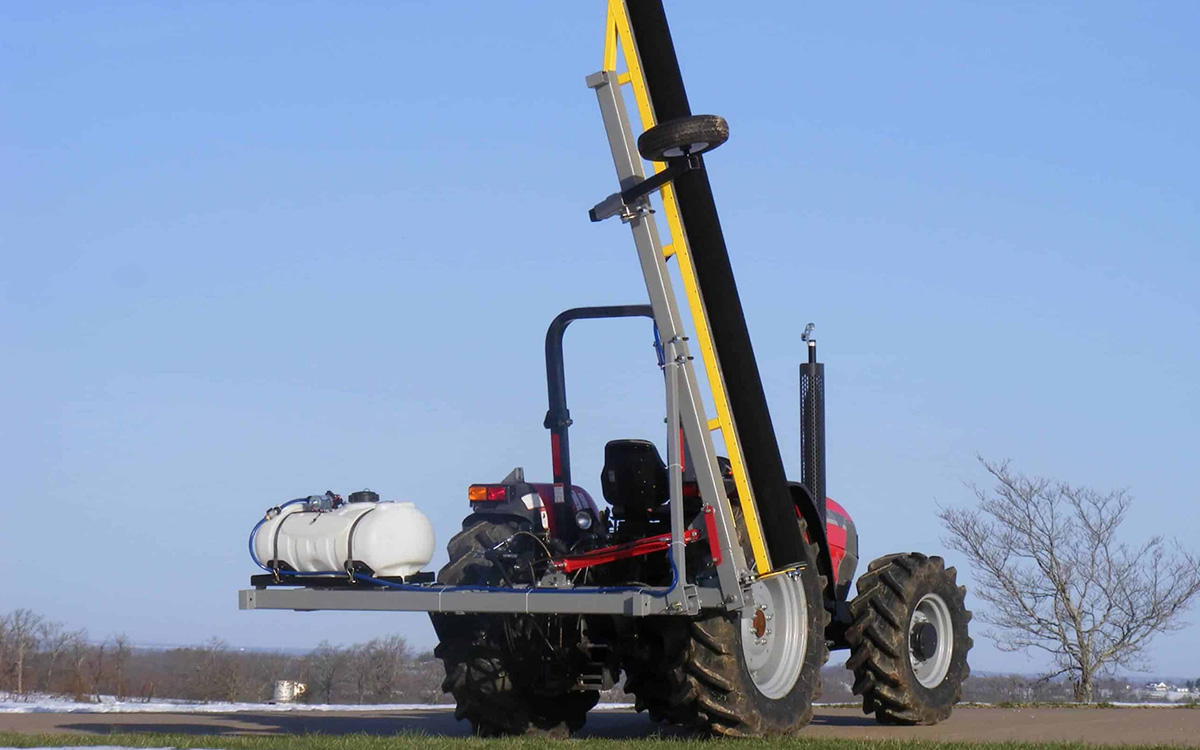 A GrassWorks Flex Unit Weed Wiper demonstrating low-drift herbicide application for environmentally safe weed control.