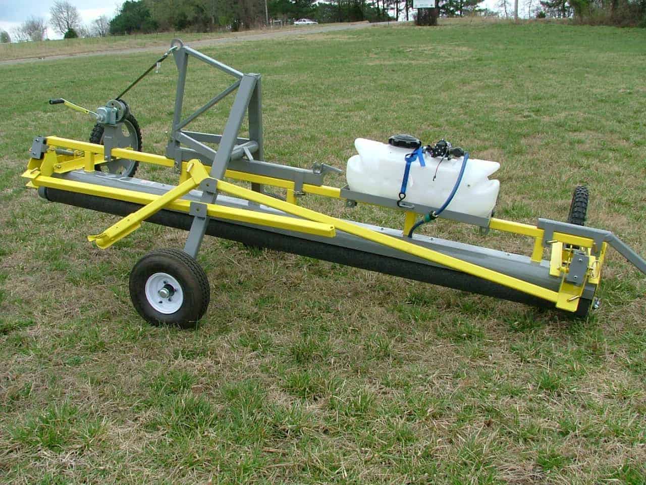"GrassWorks Heavy Duty Model Weed Wiper with wicking roller and herbicide tank, designed for precision weed control in farms, ranches, and conservation areas."